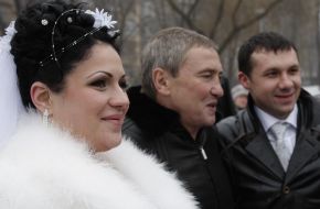 Leonid Chernovetsky and newly-weds