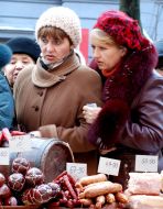 Women buy meat products