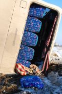 Перевернутый пассажирский автобус