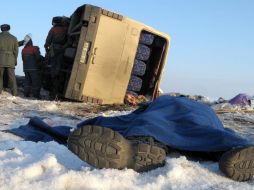 Перевернутый пассажирский автобус