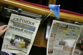 Deputies read newspapers
