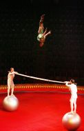 Acrobats on balloons