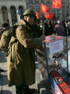 The action participant gives up money in a box