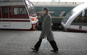 Passer-by near a city electric railway