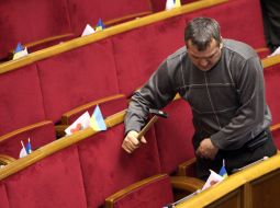 A worker repairs a chair