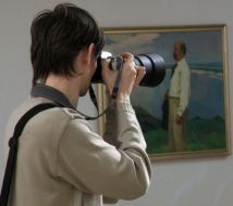 A photographer takes off a picture