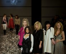 Models demonstrate clothes for expectant mothers