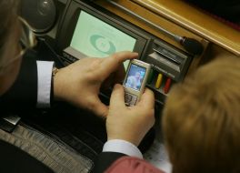 Petr Simonenko shows the photo of the daughter