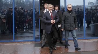 Leonid Chernovetsky goes out from a fitness-center