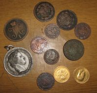 Chinks and silver medallion with representing Napoleon