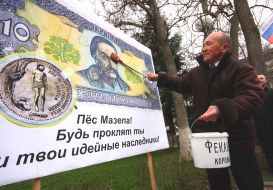The mass meeting participant coats by manure the portrait of Mazepa