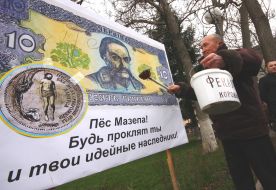 The mass meeting participant coats by manure the portrait of Mazepa