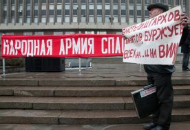 Участник митинга