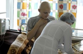 A doctor examines a patient