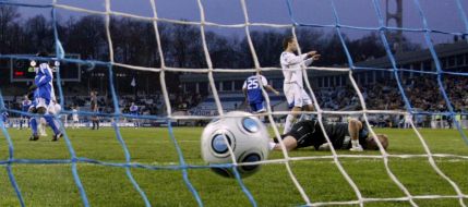A ball is in the goal of  FC “Chernomorets” (Odessa)