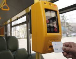Validator with an electronic ticket-punch