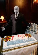Representing Leonid Kravchuk near a festive cake