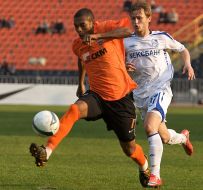 Fernandinho and Dmitriy Grishko