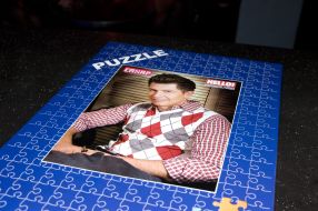 Puzzle with Andrey Dzhedzhula representing