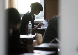 Schoolchildren executes the tests tasks