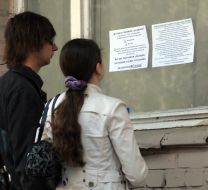 Young people read rules