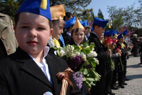 A boy with ribbon of St. Georgiy