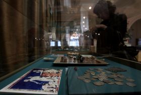 A visitor examines the exhibits