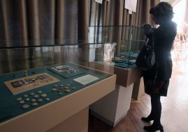 A visitor examines the exhibits