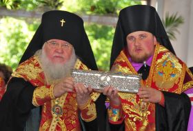 A priest takes relics