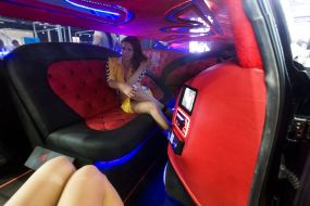 Models in a limousine