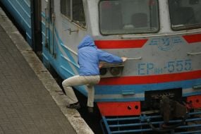 Man climbs on a platform