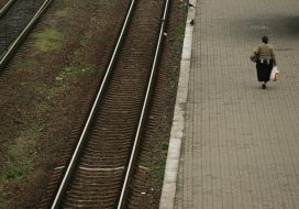 A woman goes on a platform
