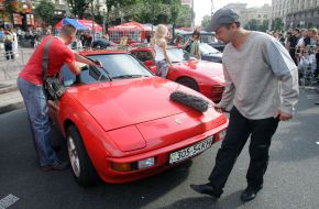 Автомобиль марки ”Porsche”