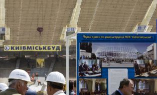 ABuilders work on ”Olympiyskiy” stadium