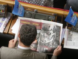 Party of Regions deputy reads a newspaper