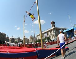 A sportsman executes a pole vault