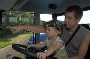 Tractor driver with son