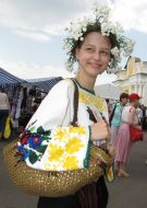 The girl with a chaplet on a head