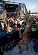 A girl dances in soap-suds