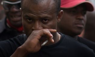 Mourning procession participant