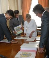 Yuriy Savchuk, Yulia Timoshenko and Mikhail Livinskiy