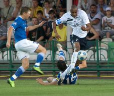 Musavenkosi Mguni, Andrey Rusol and Ruslan Rotan