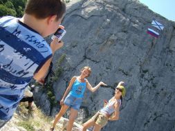Flag of Russia and St. Andrew’s flag on a rock