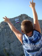 Flag of Russia and St. Andrew’s flag on a rock