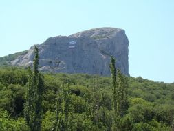 Flag of Russia and St. Andrew’s flag on a rock