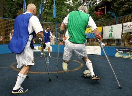 Champ participants play soccer