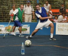 Champ participants play soccer