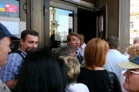 ”Rodovid bank” depositors stand in a queue