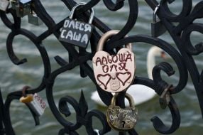 The locks of ”love” hang on a bridge