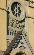 A large window ”rose” on the facade of Roman Catholic church
